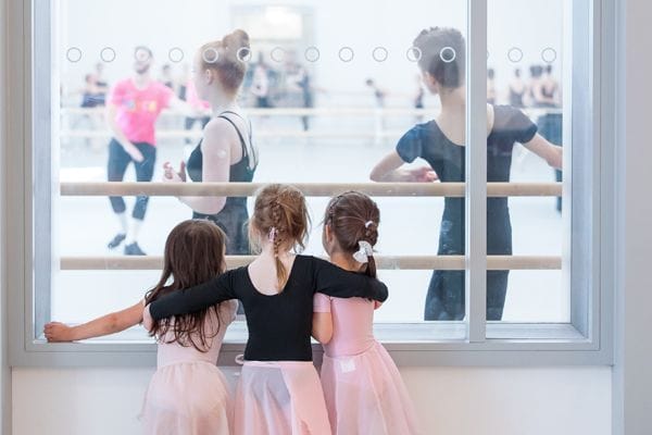 Young students watching older class