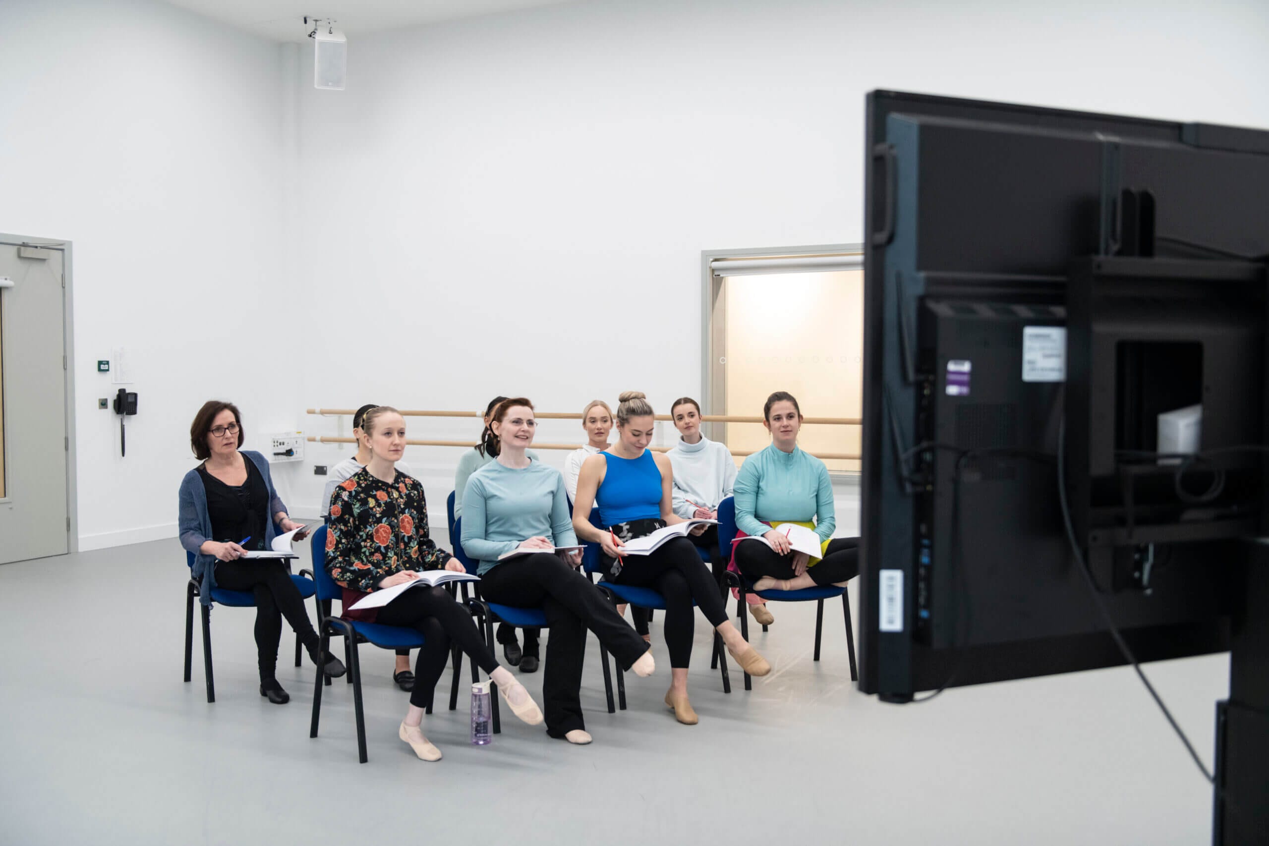 Image of attendees watching an online event